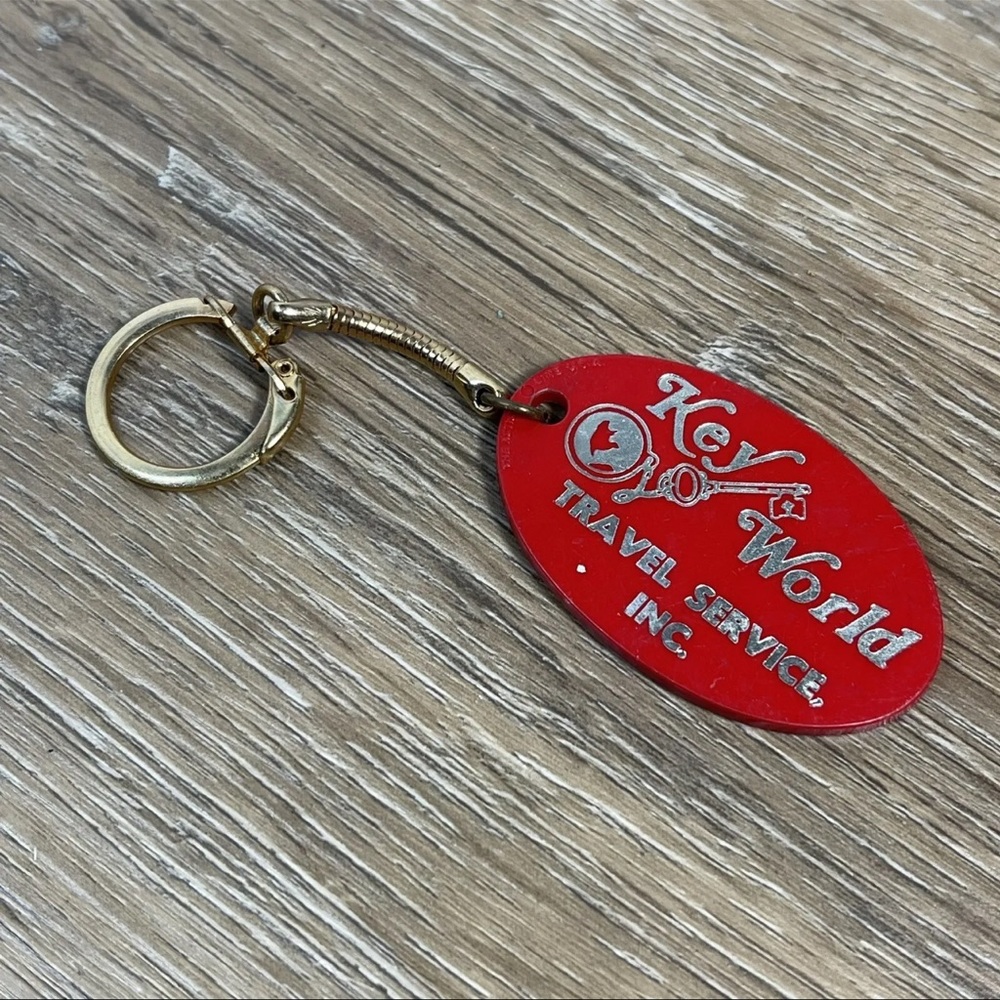 Vintage Keychain Key World Travel Service Inc Key ring Red Oval Shape Clasp Ring